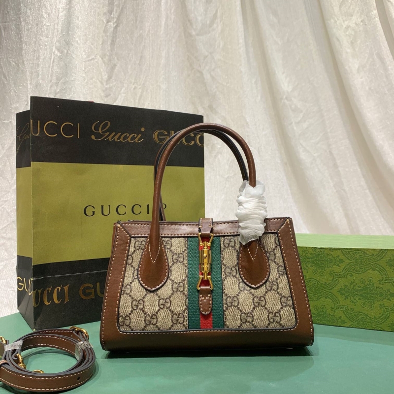 G*u*i top handle bags
